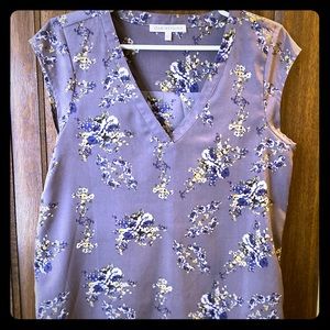 Purple floral sleeveless blouse